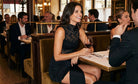 Sienna Lace Mini Dress styled on a model in an elegant french restaurant
